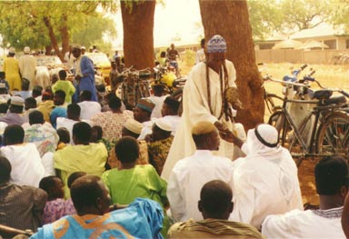  Bawku, Ghana, 1992. Moslem men gather for a religious ceremony. Bawku is has about half     Moslem and half Christian. There is very little tension between the two groups. Photo by Wayne Breslyn.
